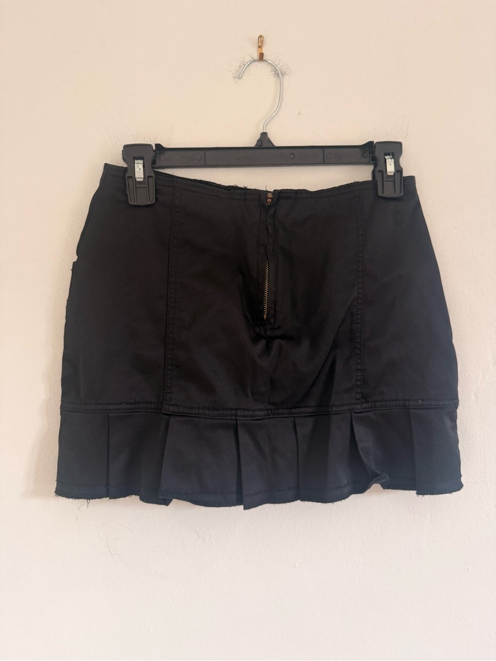 Black Pleated Mini Skirt with Grommet Pocket Detail - Picture 2 of 3
